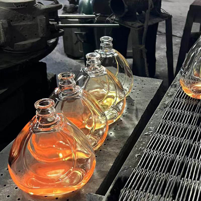 What processes are needed to produce glass bottles?